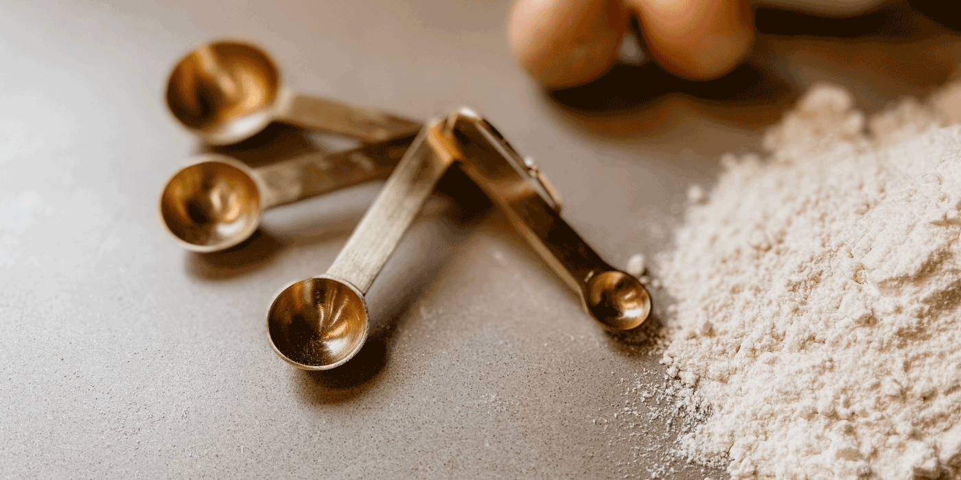 copper measuring cups and spoons